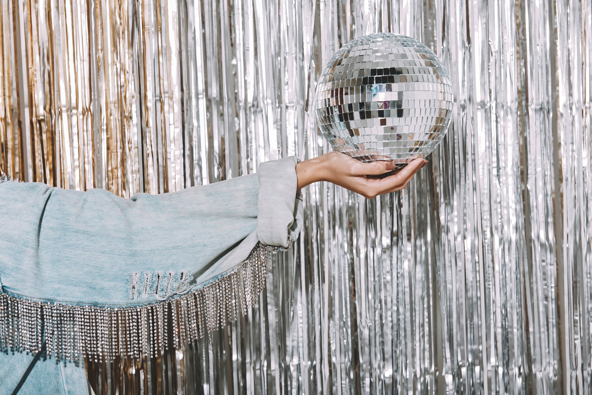 Hand Holding Disco Ball